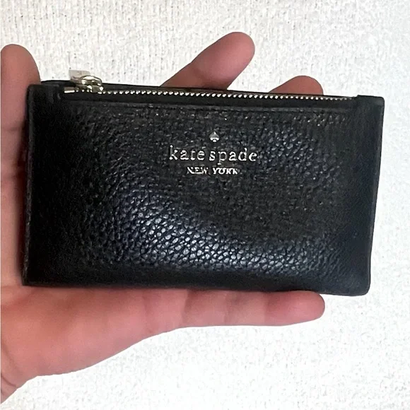 KATE SPADE - NEVER USED. Small wallet fits smaller crossbody or pocket. - Picture 1 of 9